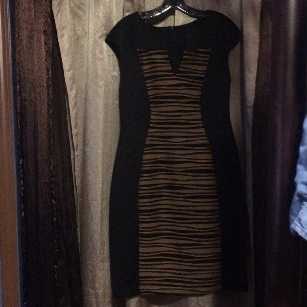 Tight black and light brown dress